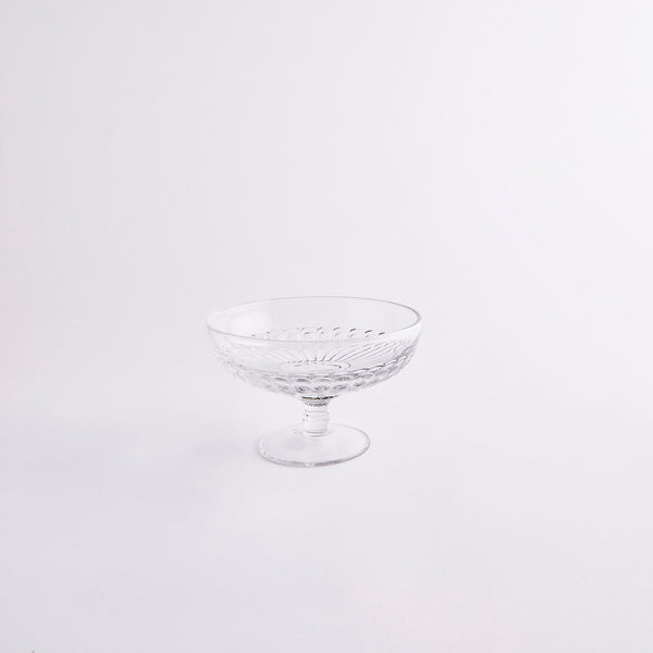 Clear sundae glass with embossed design.