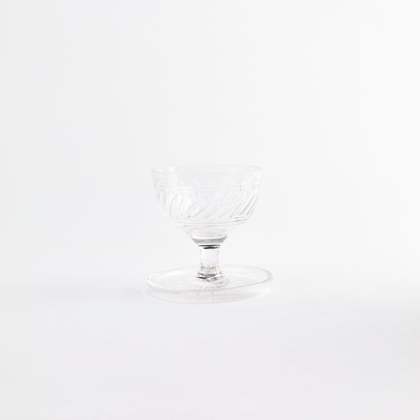 Clear sundae glass with embossed design.