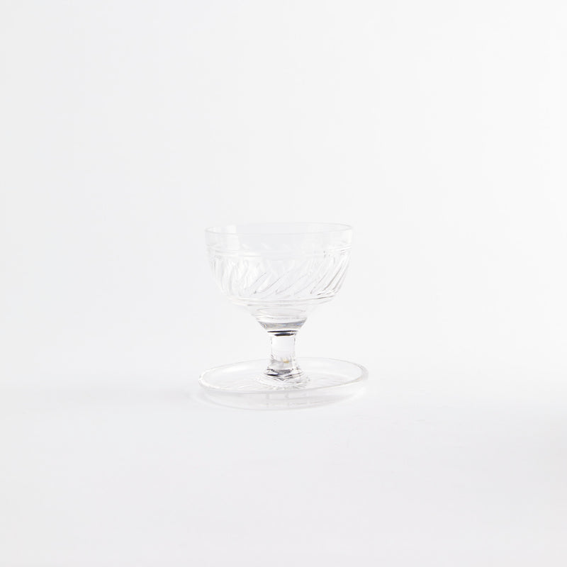 Clear sundae glass with embossed design.