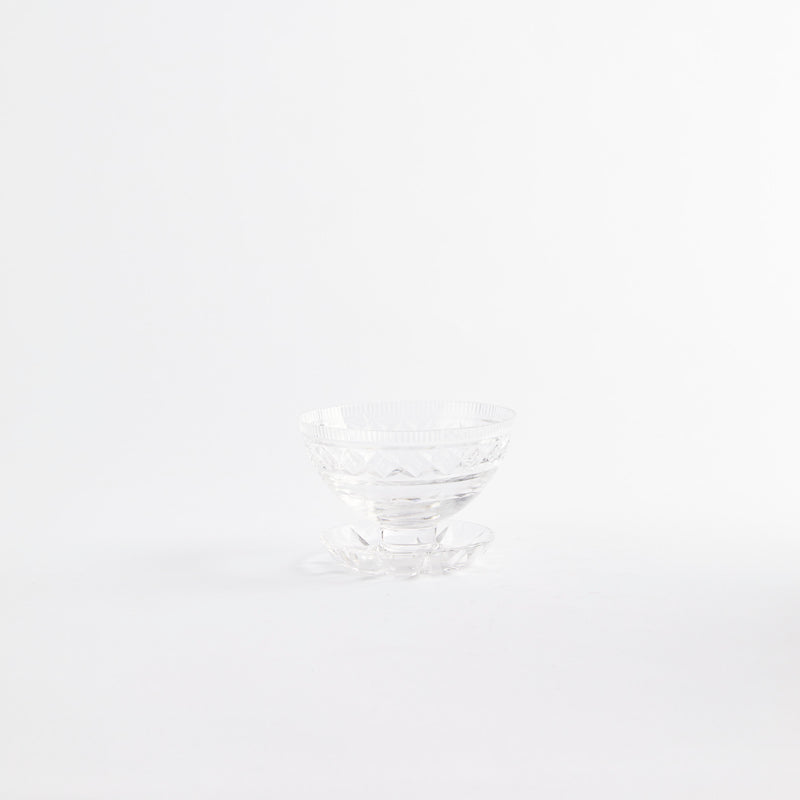 Clear sundae glass with embossed design.