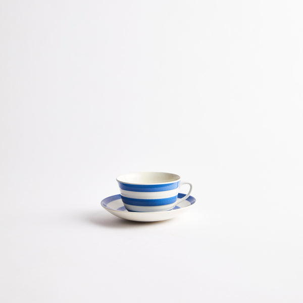 Blue and white striped teacup and saucer.