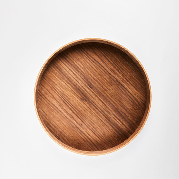 Round wooden tray.