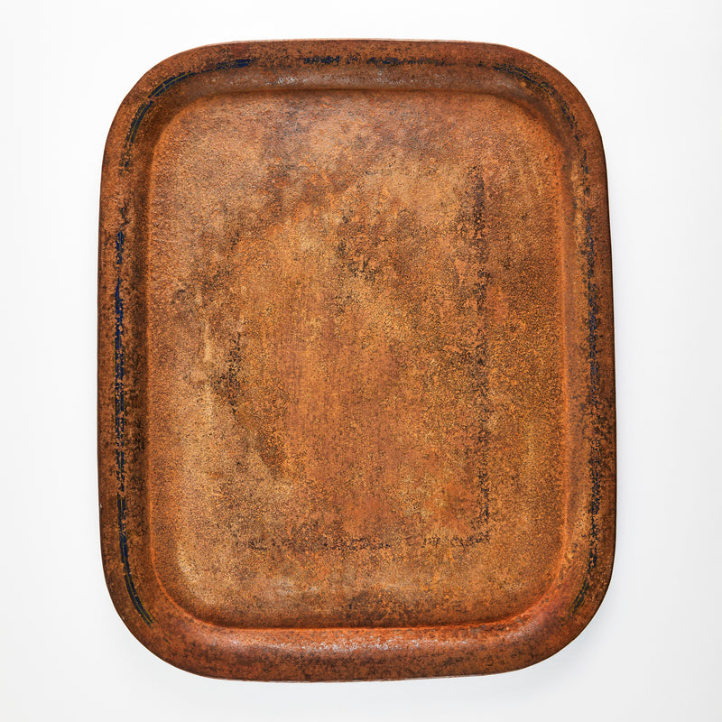 Rusted metal tray.