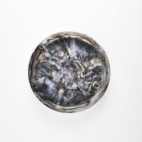 Grey marbled circular resin tray.