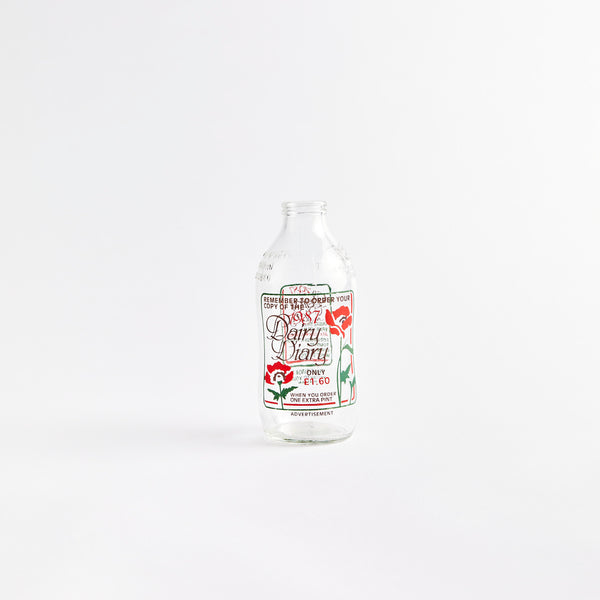 "Dair Dairy" 1987 clear glass vintage bottle.