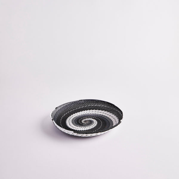 Black and white swirl woven basket.