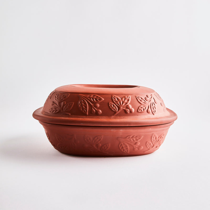 Terracotta baking dish with lid. 