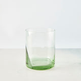 Clear light green glass tumbler.