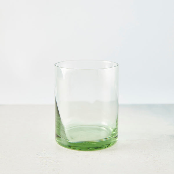 Clear light green glass tumbler.