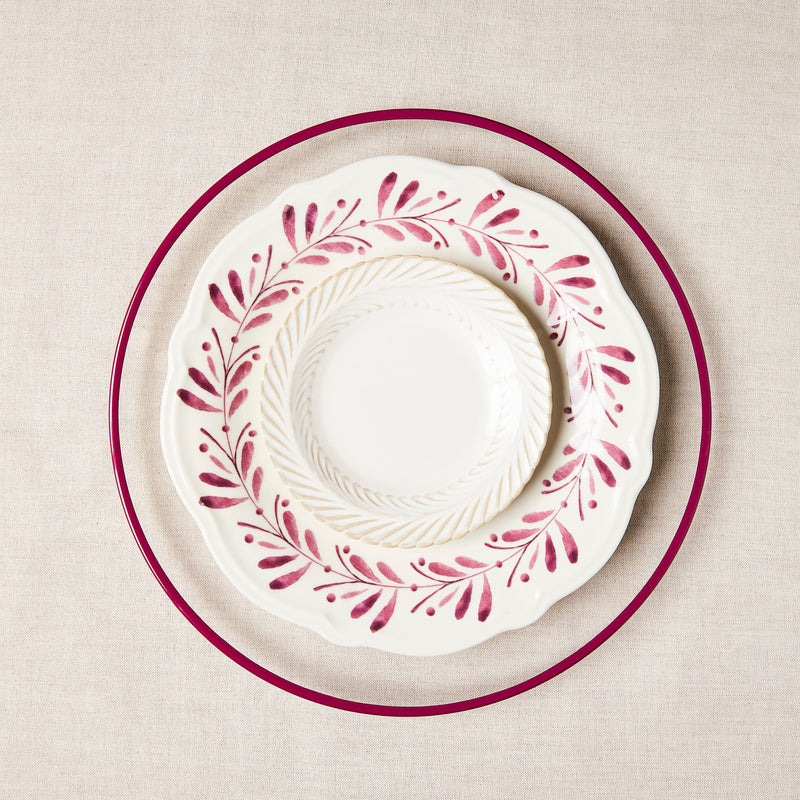 Dark pink charger and White with dark pink garland mixed plates.