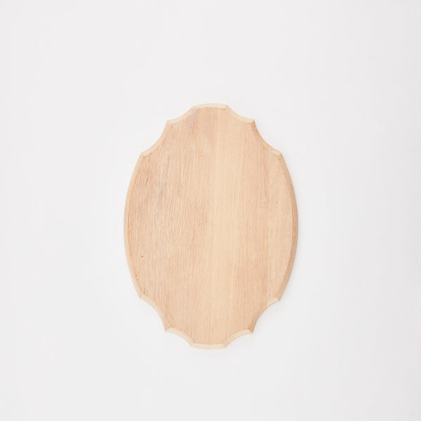 Circular with edges light wooden board.