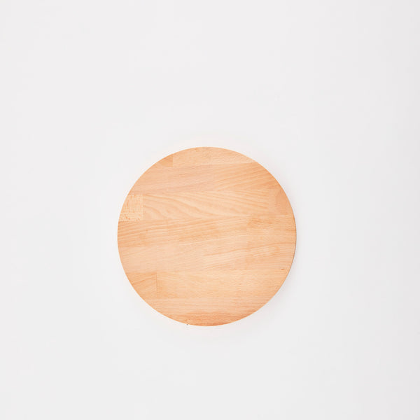 Circular wooden board.
