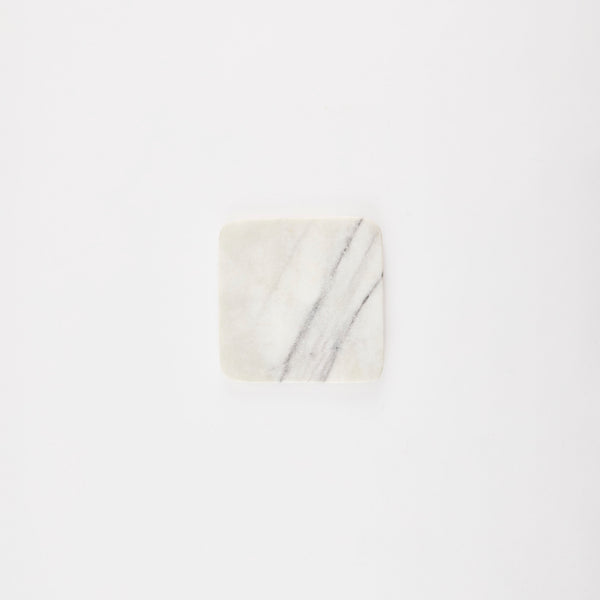 Square white marble board.