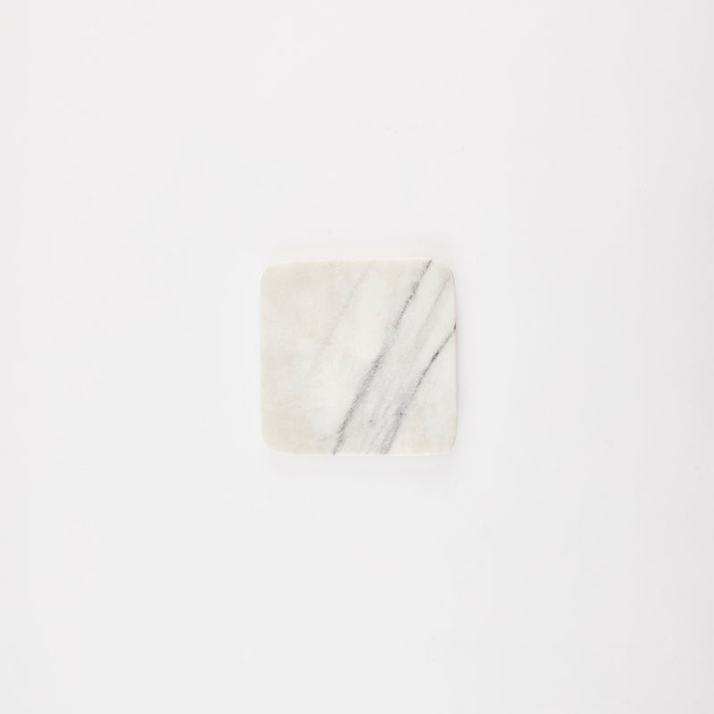 Square white marble board.