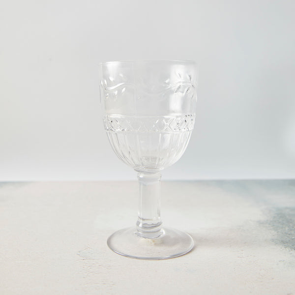 Clear embossed wine glass.