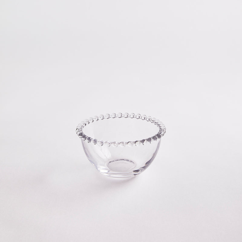 Clear glass with decorative edge bowl.
