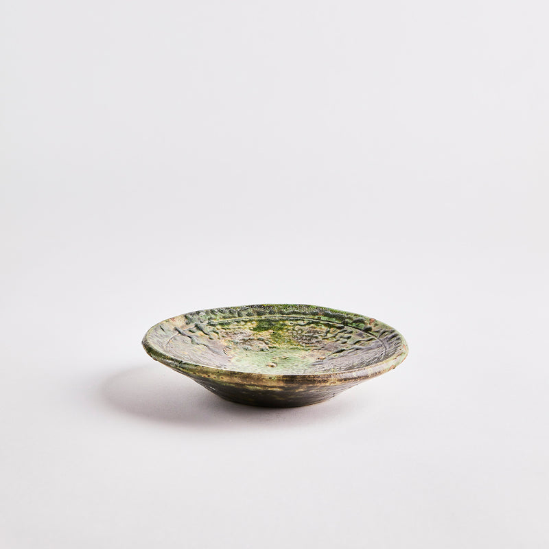 Green with embossed decorative bowl.