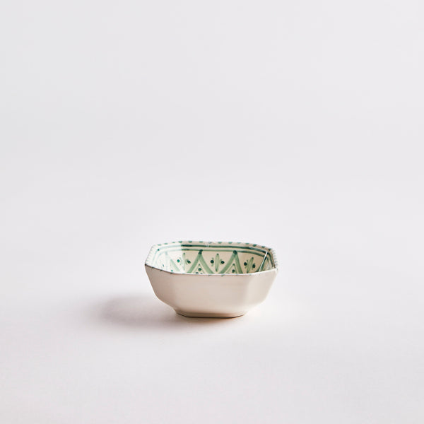 Cream with green decorative inside bowl.