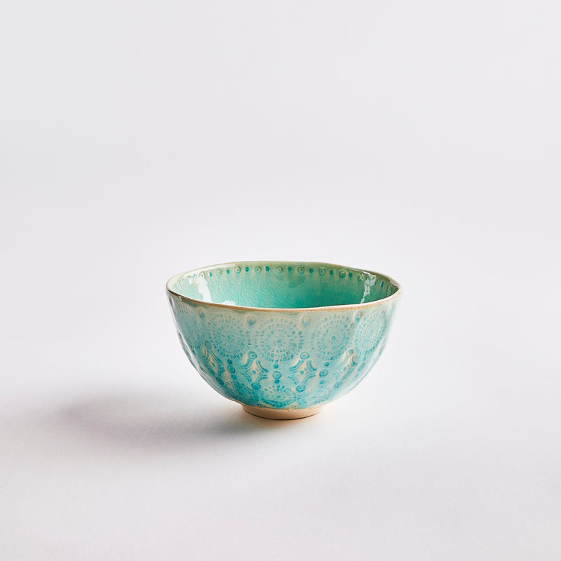 Turquoise with gold rim bowl.