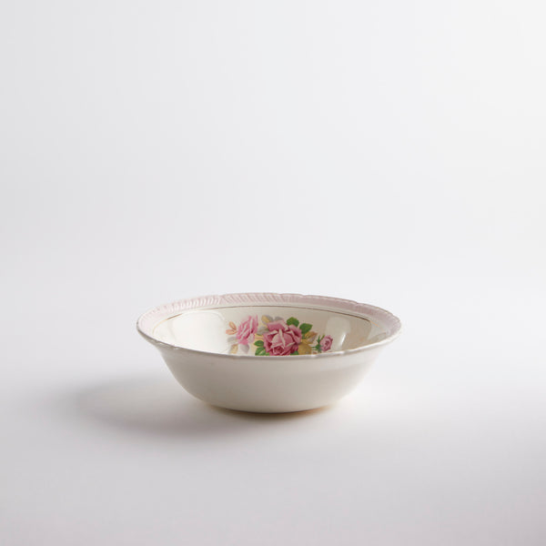 white and pink floral inside bowl.