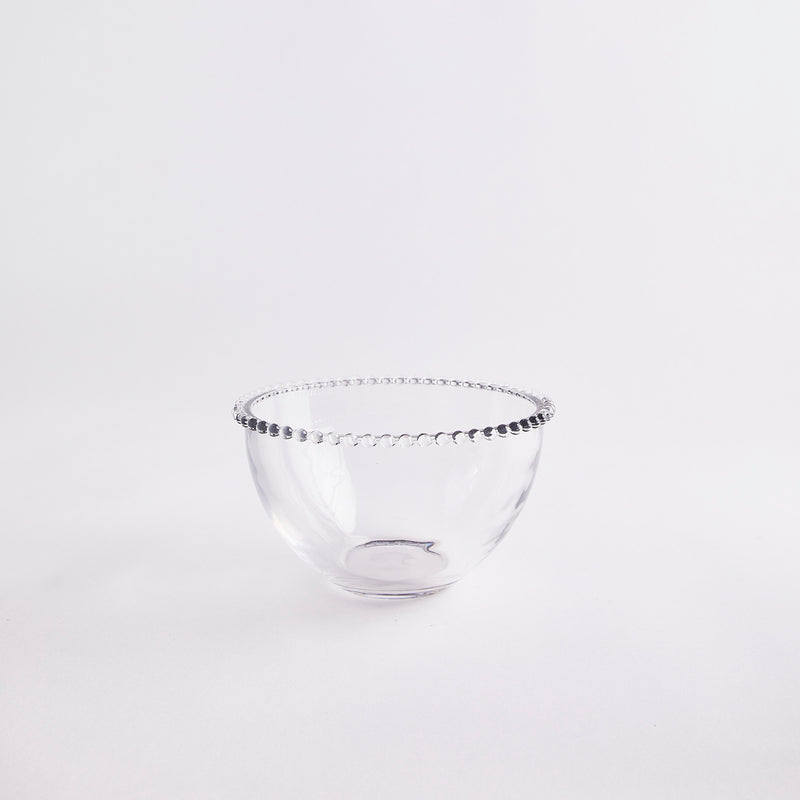 Clear glass bowl with beaded rim.