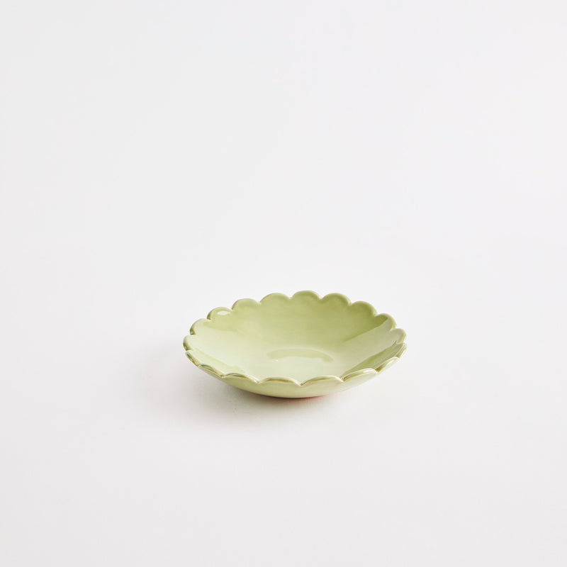 Green scalloped edge bowl.