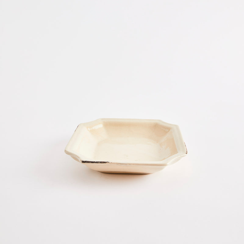 Cream bowl with edges.
