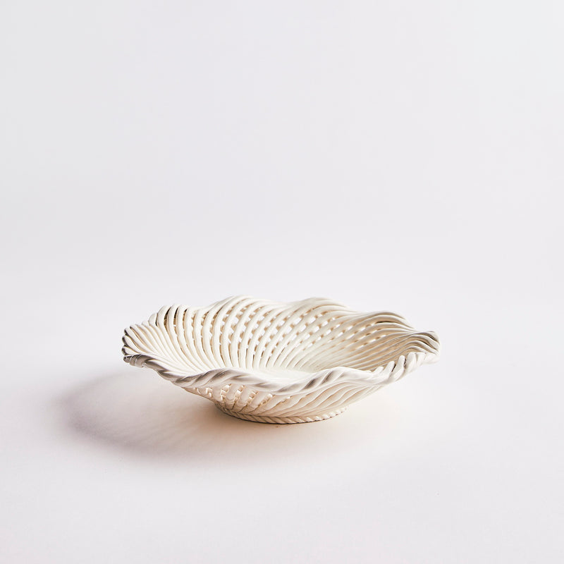 Cream scallop decorative bowl.
