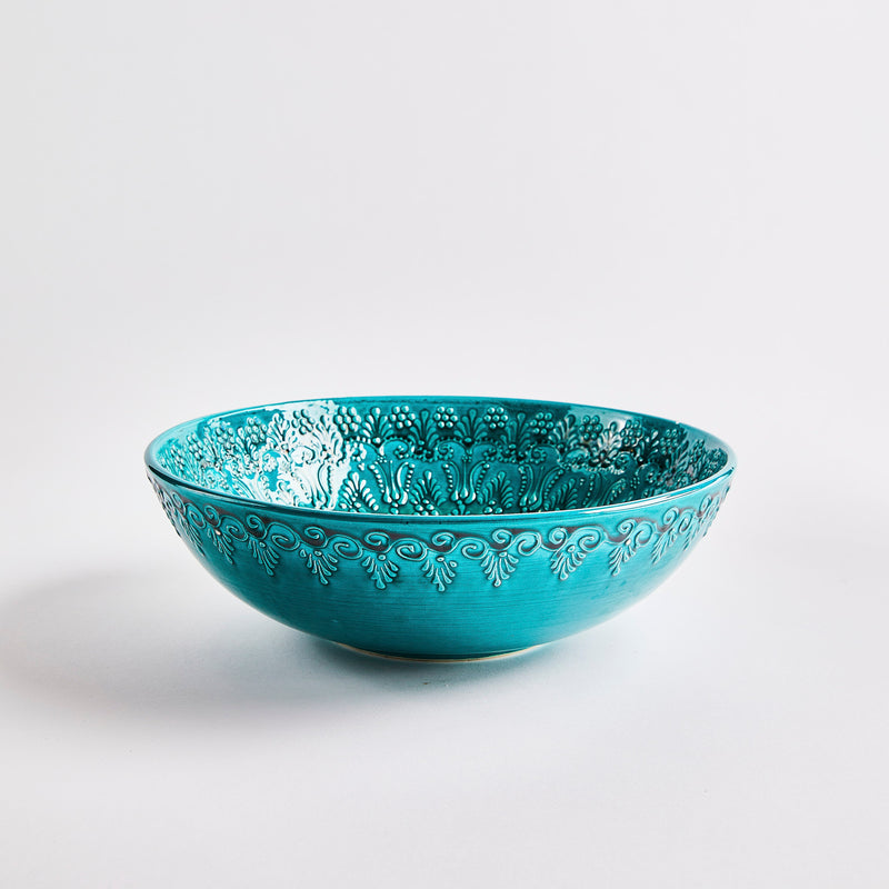 Embossed turquoise bowl.