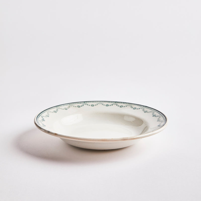 White with green decor edge bowl.