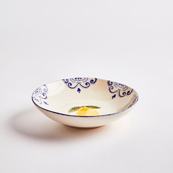 White and blue with lemon inside bowl.