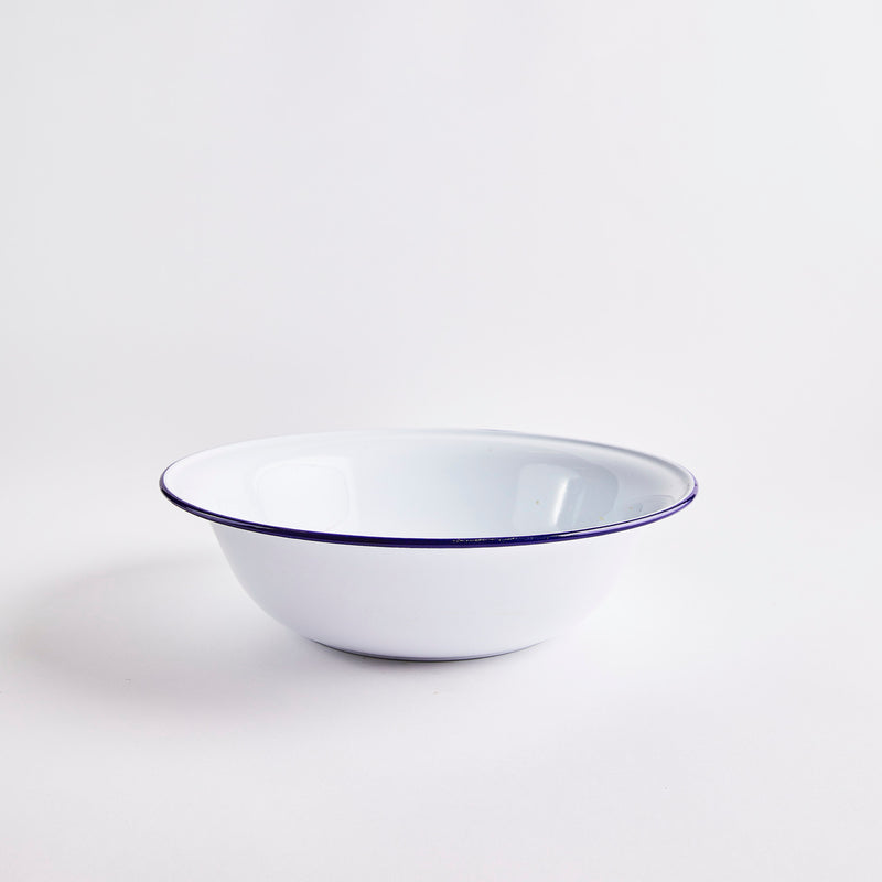 White bowl with navy rim.