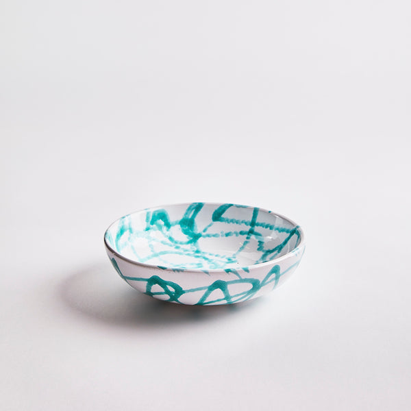 White with turquoise drawings bowl.