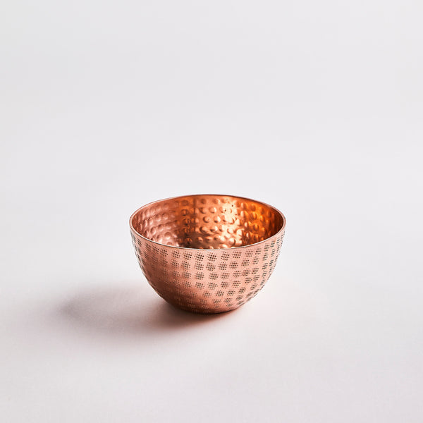 Copper bowl.