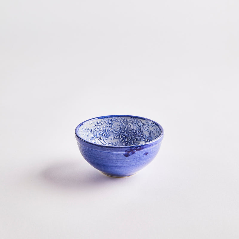 Blue with embossed inside bowl.