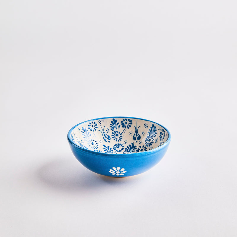 Blue decorative inside bowl.