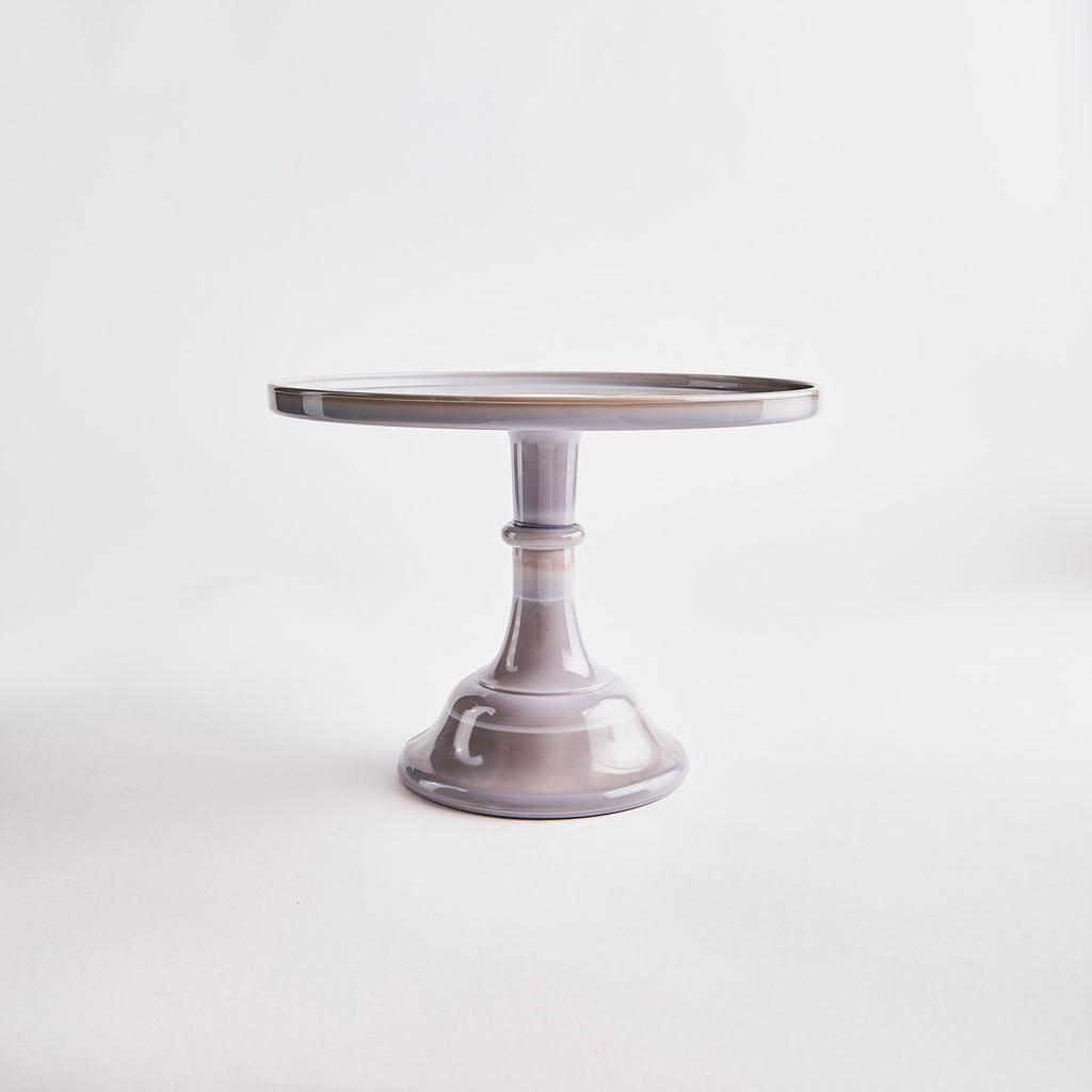 Grey cake outlet stand