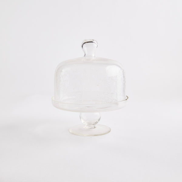 Clear glass cake stand with lid. 