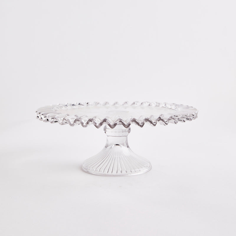 Clear glass with ruffled edges cake stand.
