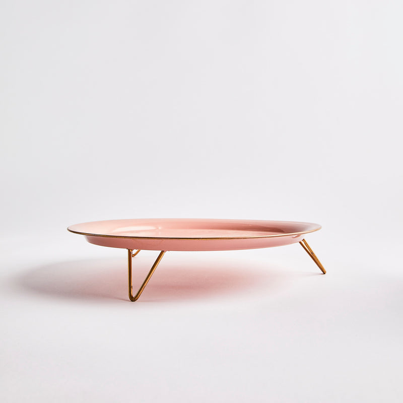 Pink with gold hairpin legs cake stand.