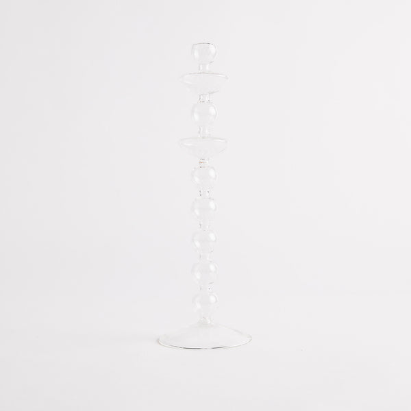 Glass circular tier candle holder.
