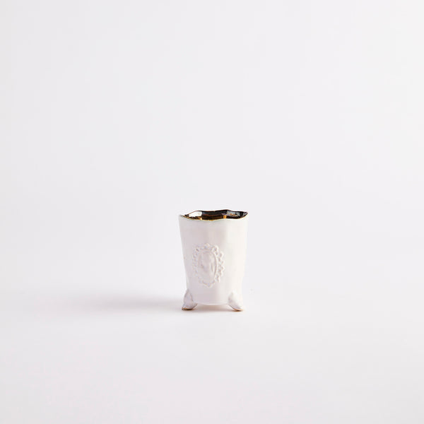 White candle holder.