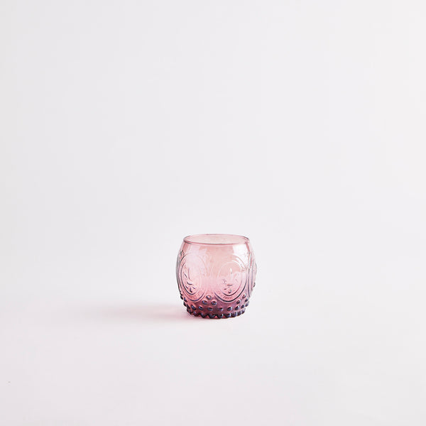 Purple candle holder.