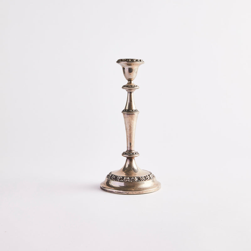 Antique silver candle holder.