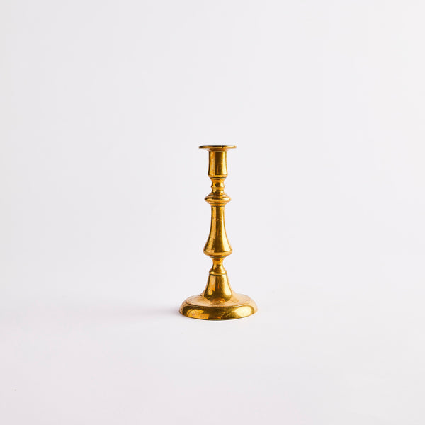 Gold candle holder.