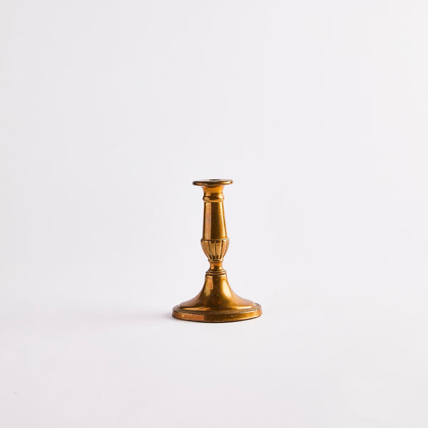 Gold candle holder.