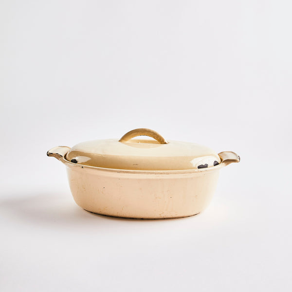 Cream casserole dish with lid.