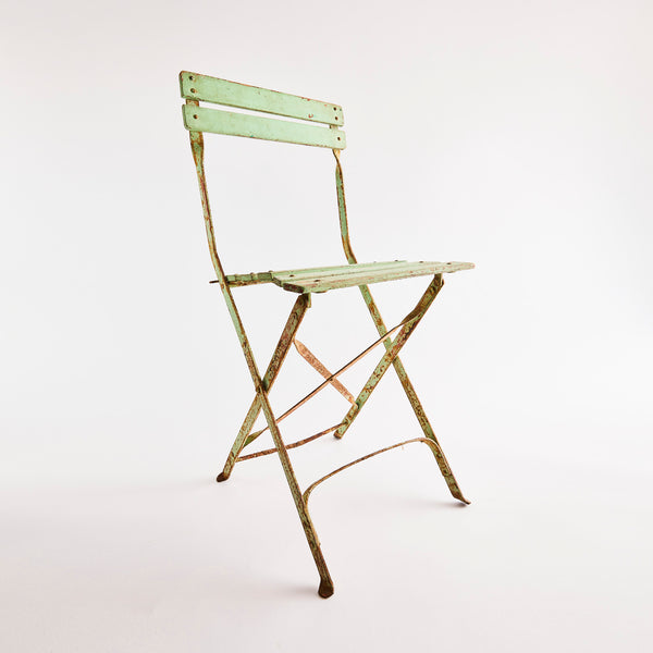 Mint green rustic chair.