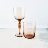 Light brown tumbler and wine glass mix set.