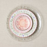 Clear embossed and pink floral vintage mixed plates.